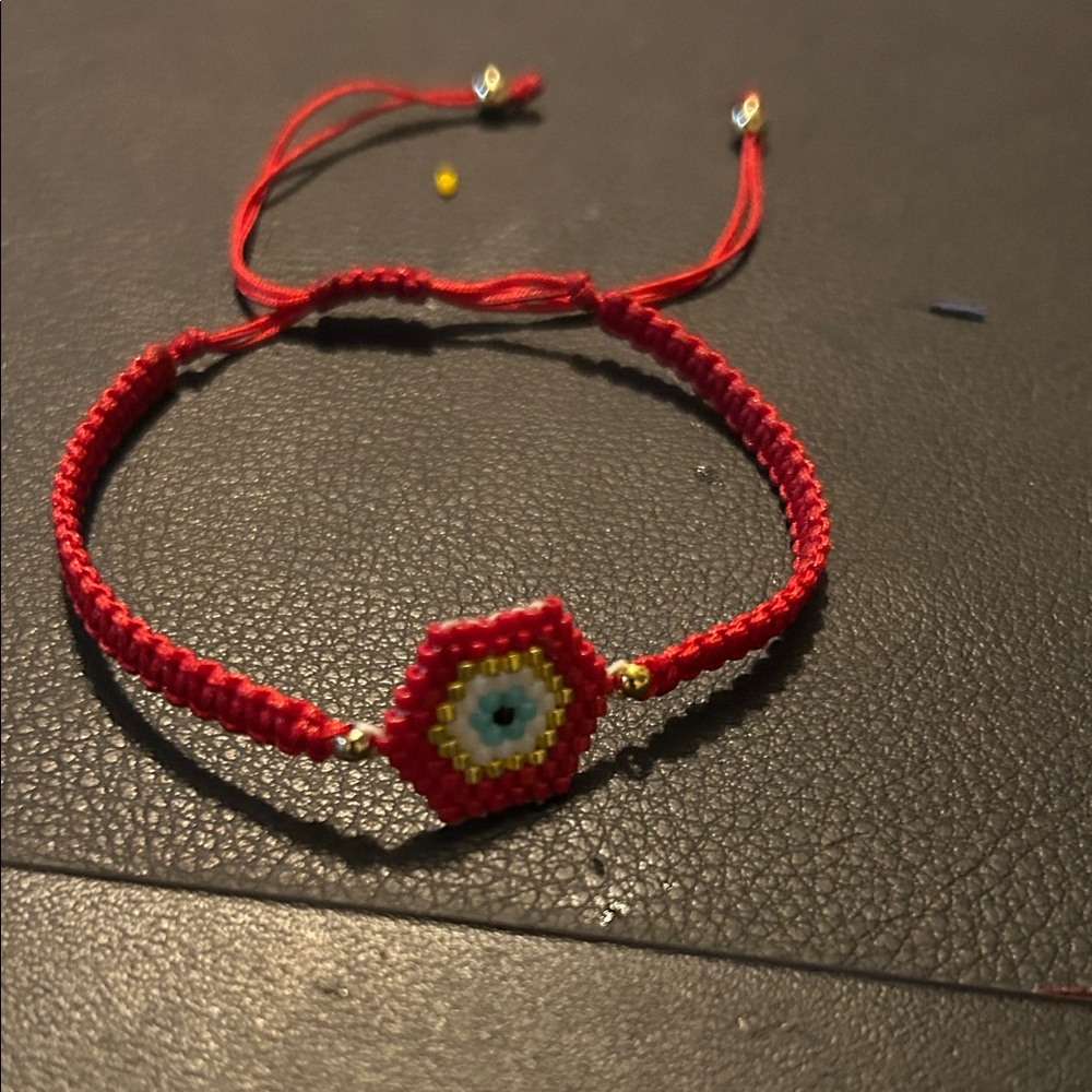 Evil Eye Red Woven Bracelet with Colorful Bead Design